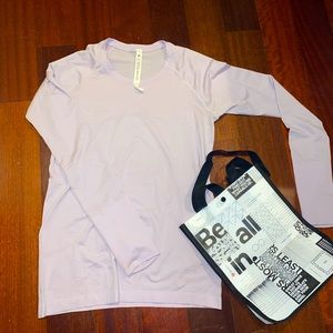 Stunning lavender swiftly tech 2.0 lulu lemon top